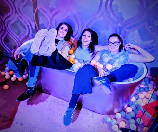 Irina, Danni and Sam in a bath of ball pit balls