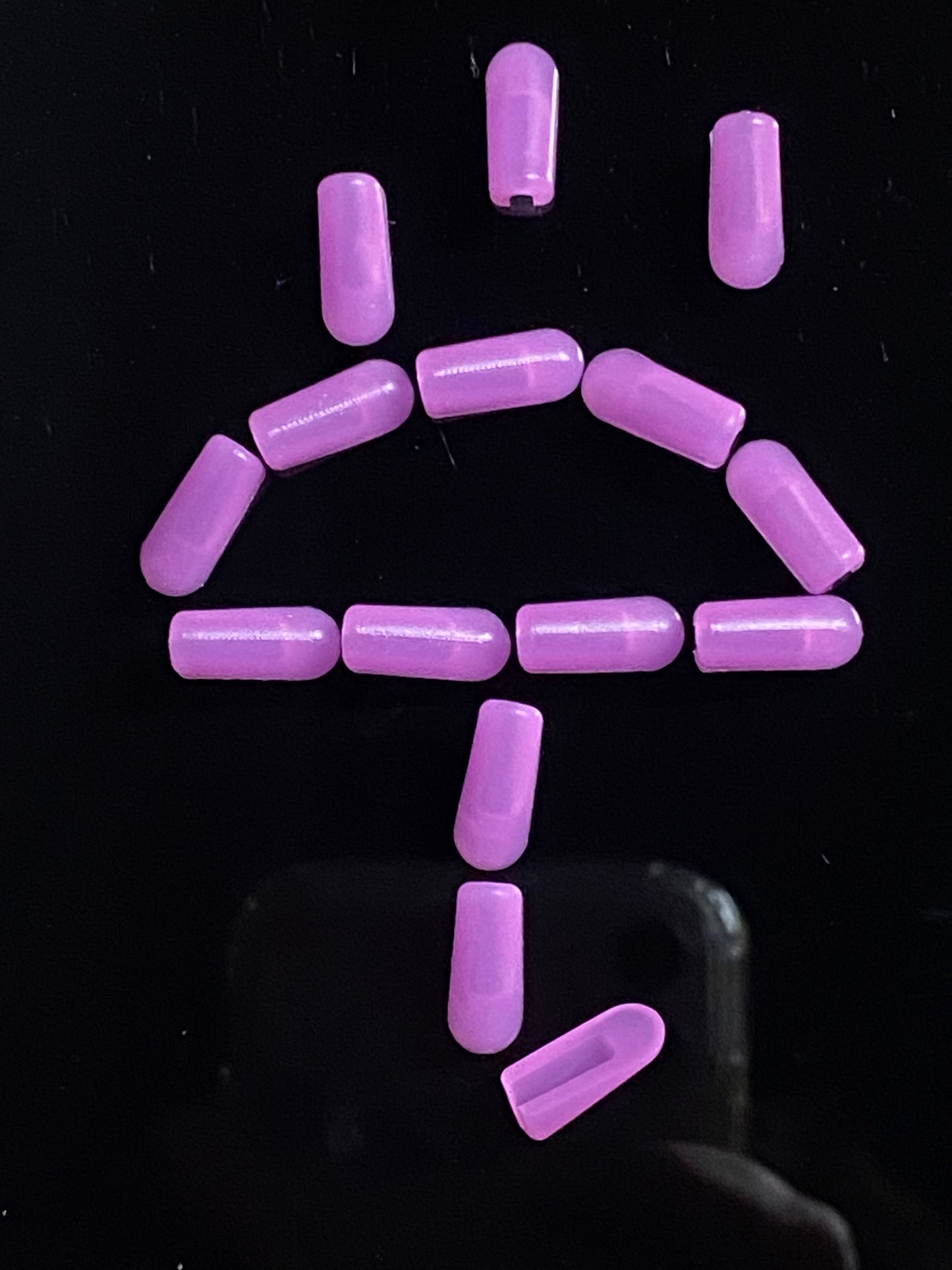 Purple end caps arranged in purple rain and umbrella