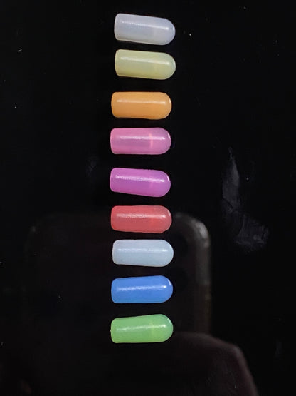 Row of 9 colours of silicone end caps
