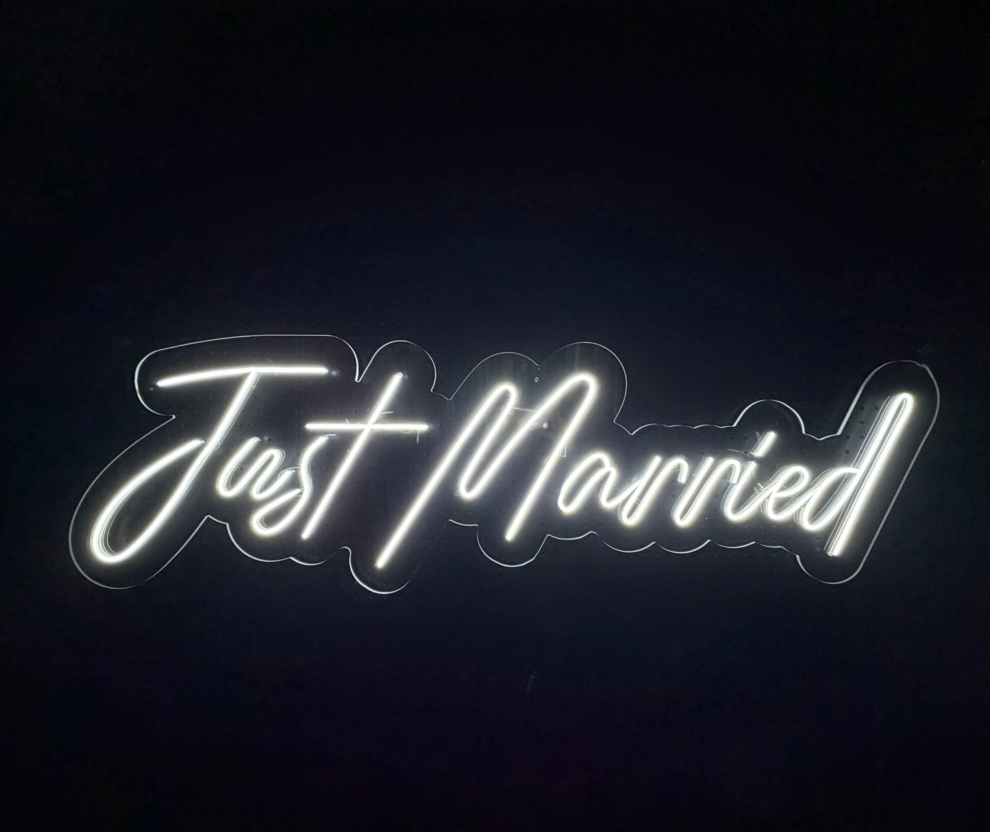 White LED Neon "Just Married" cursive on clear acrylic