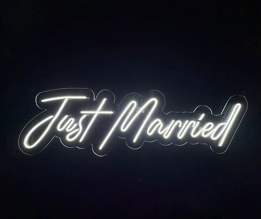 White LED Neon "Just Married" cursive on clear acrylic
