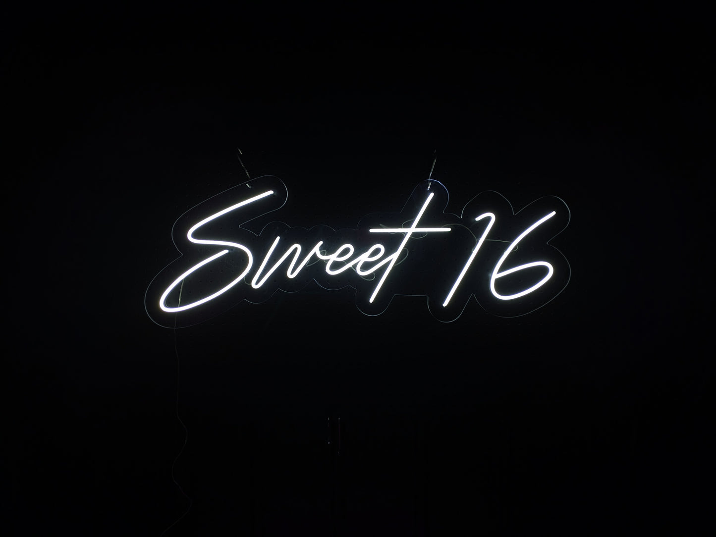 White LED Neon "Sweet Sixteen" cursive on clear acrylic