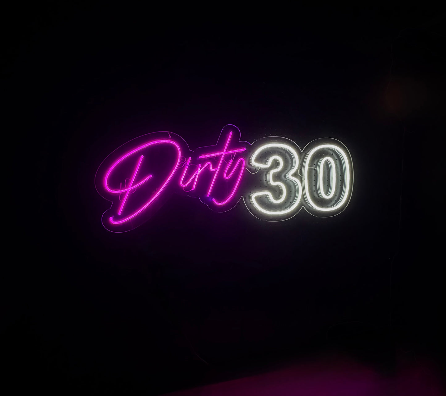 Pink and White LED Neon "Dirty 30" cursive and number on clear acrylic