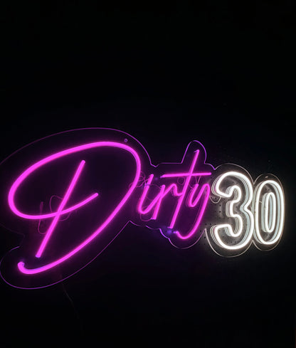Pink and White LED Neon "Dirty 30" cursive and number on clear acrylic