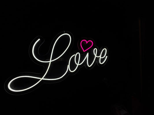 White and Pink LED Neon "Love" cursive and heart shape on clear acrylic