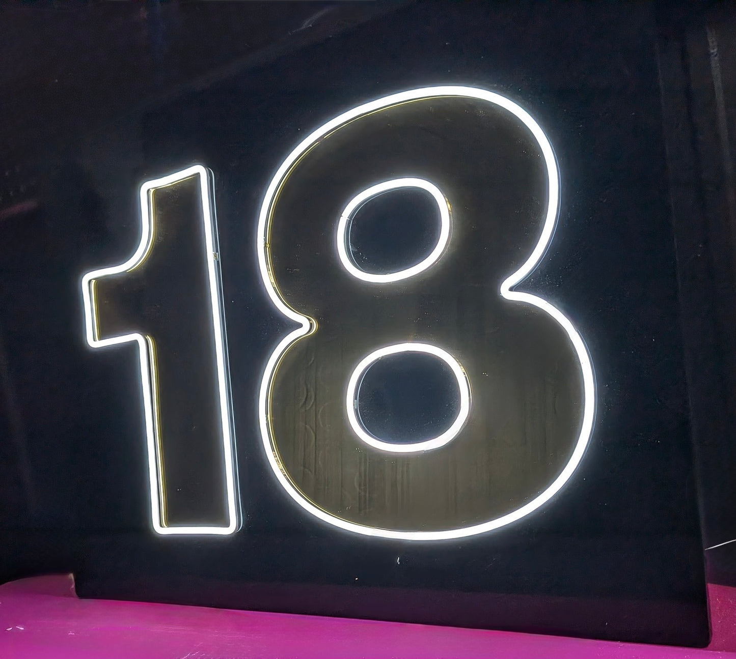 White LED Neon "18" numbering on black acrylic with Gold mirroring